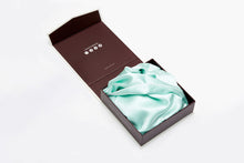 Load image into Gallery viewer, Folded teal silk pillowcase with ivory border piping presented in a gift box by Mayfairsilk