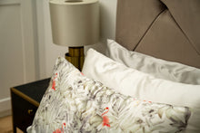 Load image into Gallery viewer, Three silk pillowcases sitting on a luxury bed, with Flamingos in the foreground, followed by Ivory pillowcase and Oyster Grey Silk pillowcase at the back