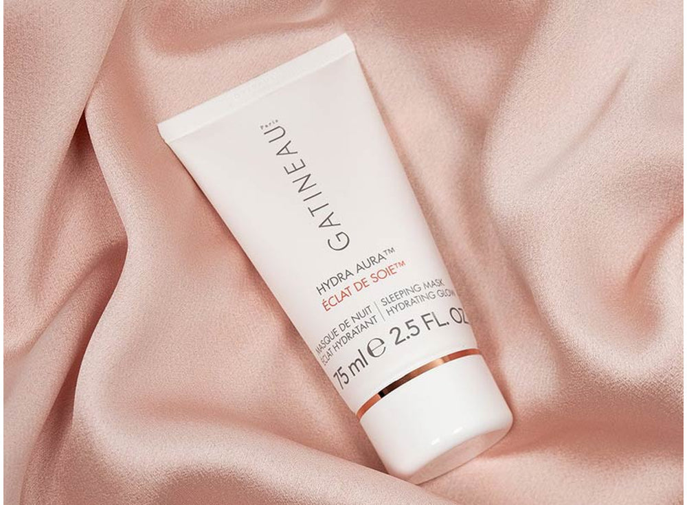 Gatineau Hydra Aqua Sleeping Mask resting on Pink Silk